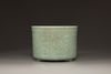 A Chinese celadon glazed tripod censer