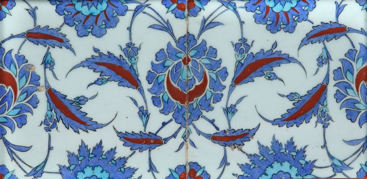 A PAIR OF FRAMED IZNIK TILES
