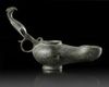 A BYZANTINE BRONZE OIL LAMP, CIRCA 5TH-6TH CENTURY A.D.
