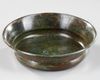 AN ACHAEMENID BRONZE LOTUS PHIALE, CIRCA 6TH-5TH CENTURY B.C.