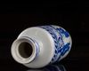 A small Chinese blue and white 'figural' rouleau vase