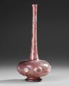A PURPLE GLASS SPRINKLER FLASK, PERSIA OR SYRIA, 9TH–11TH CENTURY