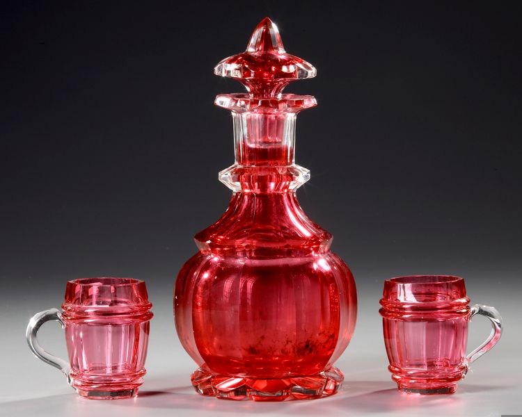 A BOHEMIAN RUBY CUT GLASS 'DRINKING SET' FOR THE ISLAMIC MARKET, CIRCA 1860