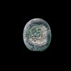 AN EARLY ISLAMIC GLASS WEIGHT OF HALF DIRHAM, 10TH-11TH CENTURY