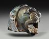AN ACHAEMENID RHYTON HEADPIECE FORM OF A ROARING LION, CIRCA 5TH CENTURY B.C.