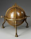 A BRASS CELESTIAL GLOBE, SIGNED BY AL-ISKANDERANI, INDIA, 19TH CENTURY