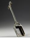 A ROMAN BRONZE INCENSE SHOVEL WITH A PANTHER HEAD, CIRCA 1ST-2ND. A.D.