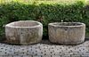 TWO SIMILAR CIRCULAR CARVED LIMESTONE TROUGHS, 18TH OR 19TH CENTURY