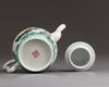 A Chinese famille rose teapot and cover