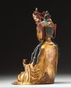 A  Chinese gilt-bronze figure of Avalokitesvara