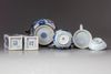 A group of six blue and white items