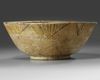 A large Islamic pottery bowl