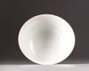 A Chinese blue-ground sgraffiato famille rose 'roundels' bowl