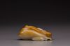 A white and russet jade magnolia carving