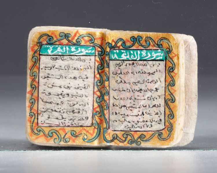 AN ILLUMINATED MINIATURE OTTOMAN QURAN