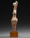 AN AMLASH TERRACOTTA STEATOPHYGOUS FIGURE, CIRCA EARLY 1ST MILLENIUM B.C.