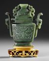 A CHINESE JADE  WITH COVER AND STAND