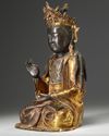 A Chinese gilt lacquered bronze figure of Guanyin