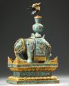 A CHINESE JADE AND CLOISONNÉ CAPARISONED ELEPHANT ON A CLOISONNÉ BASE, QING DYNASTY (1644-1911)
