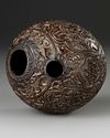 A QAJAR CARVED COCONUT HUQQA BASE, PERSIA, EARLY 19TH CENTURY