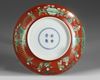 A Chinese coral-ground famille verte 'boys' dish