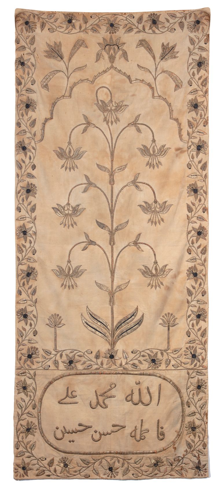 A SILVER-GILT THREAD EMBROIDERED SILK PRAYER MAT