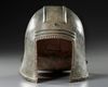 A GREEK BRONZE ILLYRIAN HELMET, CIRCA 6TH-5TH CENTURY B.C.