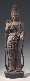 A CHINESE STANDING POLYCHROME WOOD FIGURE OF GUANYIN, LATE MING DYNASTY