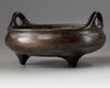 A Chinese bronze tripod censer