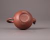 A Chinese yixing teapot and cover