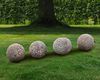 A GROUP OF FOUR STONE ORNAMENTAL SPHERES, LATE 18TH CENTURY