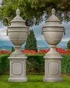 A PAIR OF LARGE AND IMPRESSIVE LIMESTONE CARVED GARDEN URNS ON PEDESTALS, LATE 20TH CENTURY
