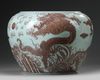 A LARGE CHINESE UNDERGLAZE RED DRAGON JARDINIERE,19TH-20TH CENTURY