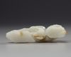 A CHINESE WHITE JADE CARVING OF THE LAUGHING TWINS