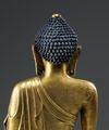 A Chinese gilt bronze figure of Buddha Shakyamuni.