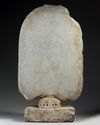 A large Chinese stone stele Buddhist triad