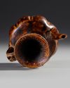 A CHINESE CIZHOU-TYPE BROWN-GLAZED EWER,SONG DYNASTY OR LATER