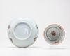 A famille verte cup and saucer