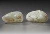TWO LARGE CHINESE PALE CELADON JADE 'BOYS' CARVINGS, 20TH CENTURY