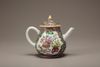 A famille rose teapot and cover
