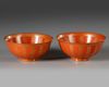 A PAIR OF CHINESE RED GLAZED BOWLS WITH CHARACTERS, 19TH CENTURY