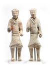 A pair of Chinese painted pottery standing soldiers