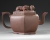 A Chinese Yixing hexagonal teapot and cover