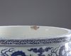 A massive Chinese blue and white 'nine dragons' jardiniere