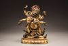 A Sino-Tibetan gilt-bronze six-armed Mahakala