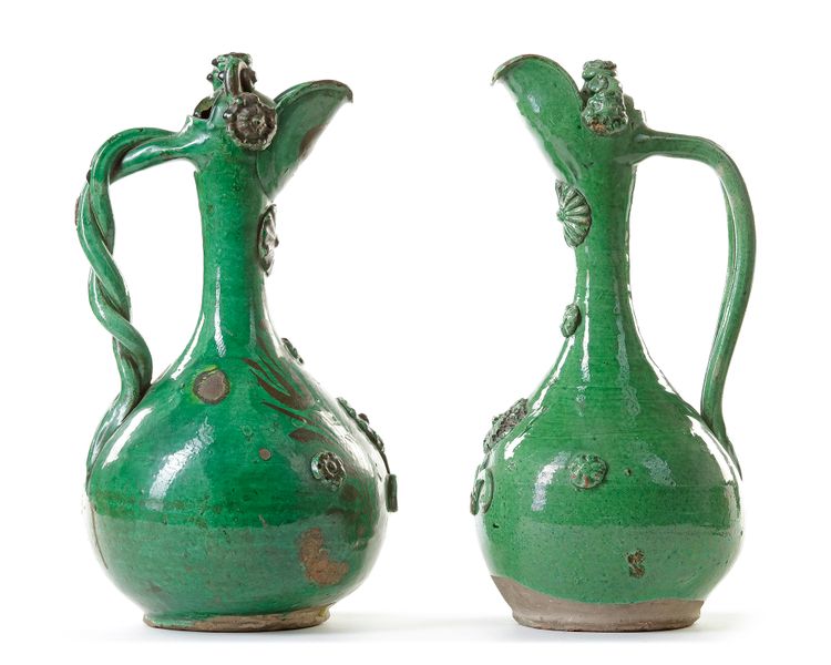 TWO LIGHT GREEN-GLAZED CANAKKALE POTTERY EWERS, OTTOMAN TURKEY, 19TH CENTURY