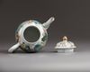 A Chinese famille rose teapot and cover