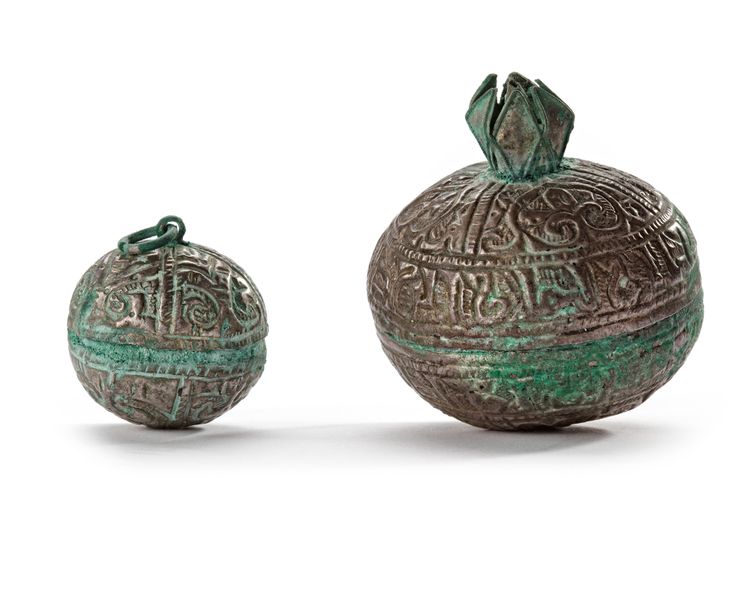 TWO FATIMID SILVER TALISMAN HOLDERS, EGYPT, 11TH CENTURY