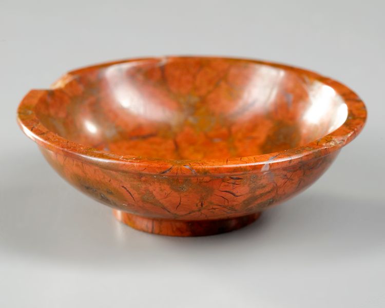 A GREEK MOTTLED RED JASPER BOWL, HELLENISTIC PERIOD 3RD-1ST CENTURY B.C.