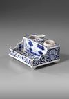 BLUE AND WHITE DELFT INKWELL AND DESK STAND, DATED 1715